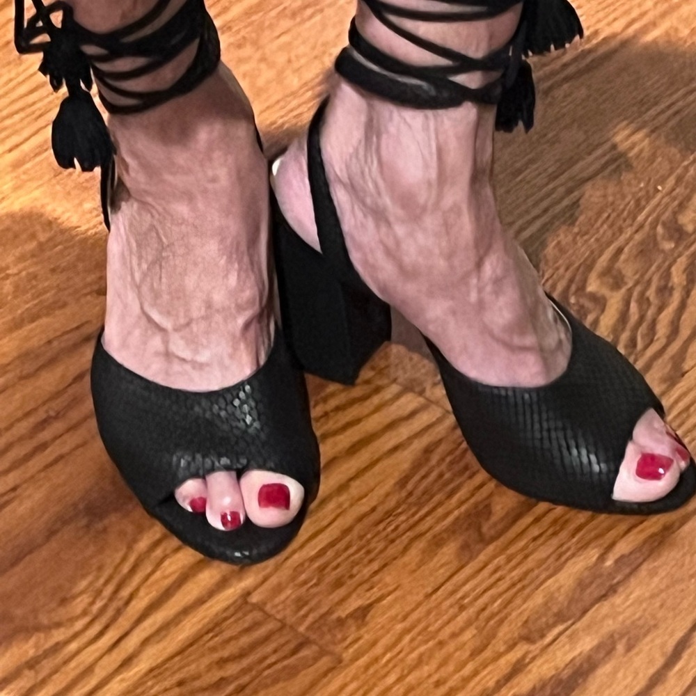Black embossed leather sandals